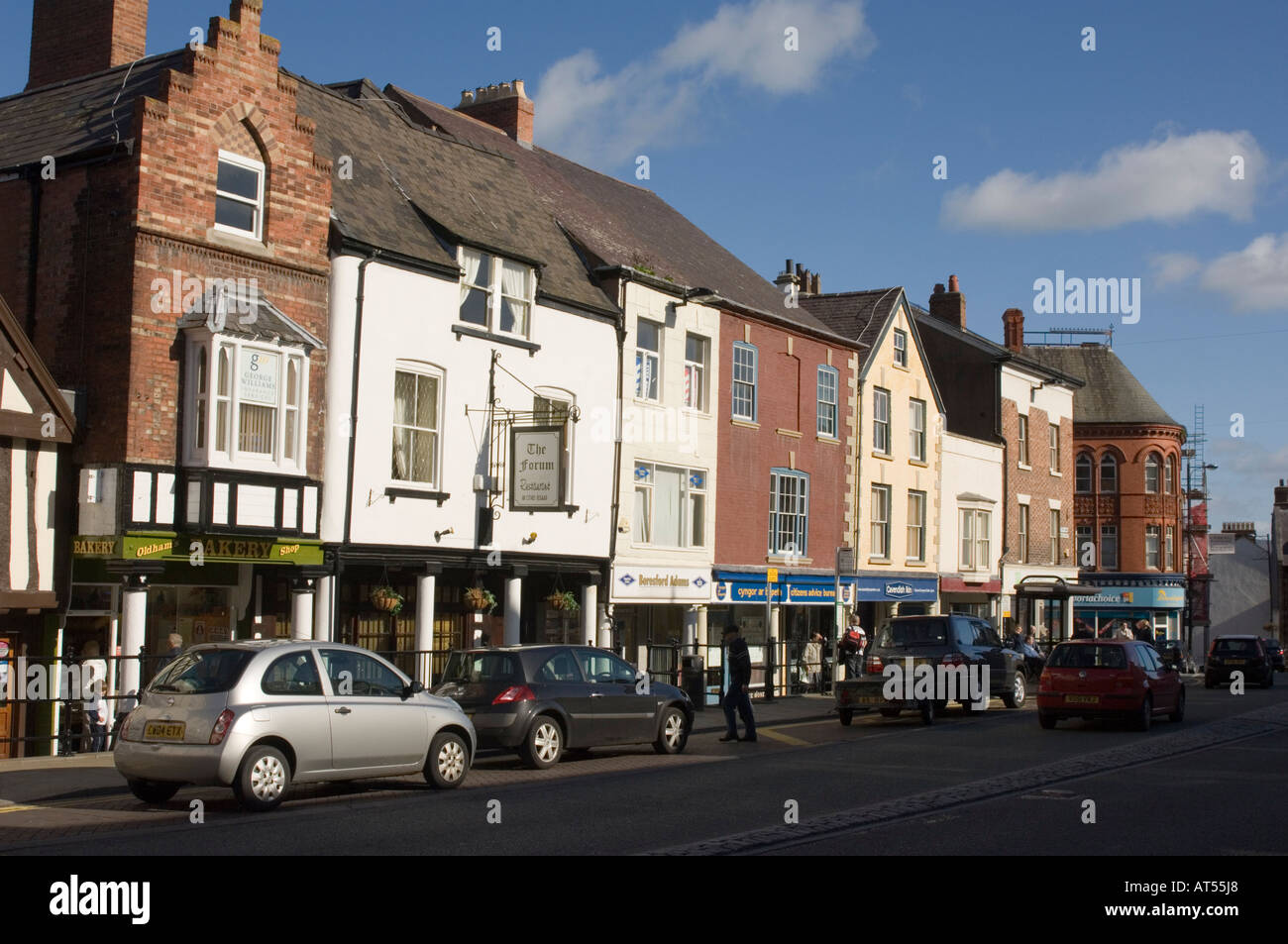 Town centre, Denbigh (Dinbych) North Wales, afternoon, sunny. Row of high street shops Stock Photo