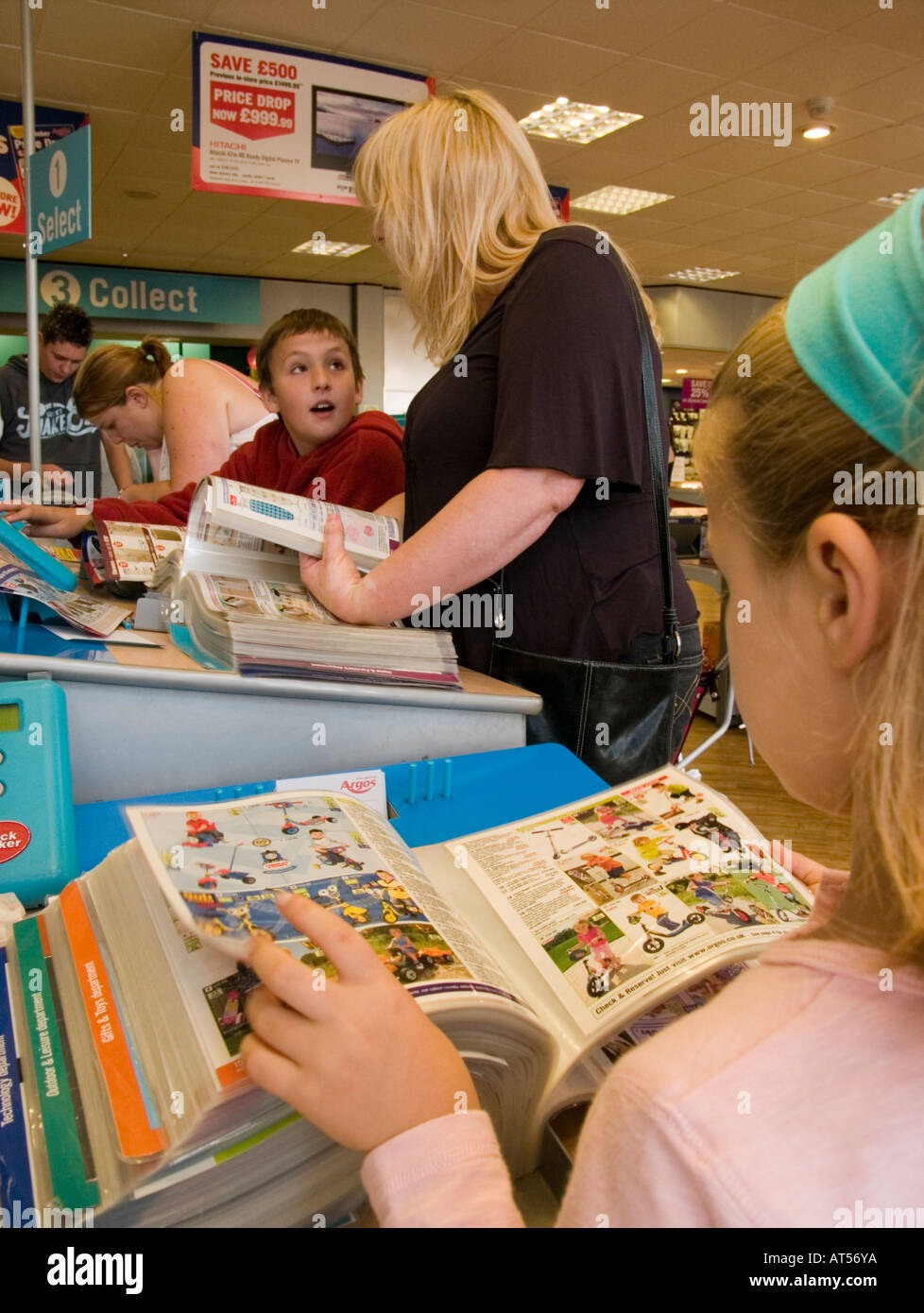 Argos catalogue store, Rheidol retail park Aberystwyth Wales UK woman