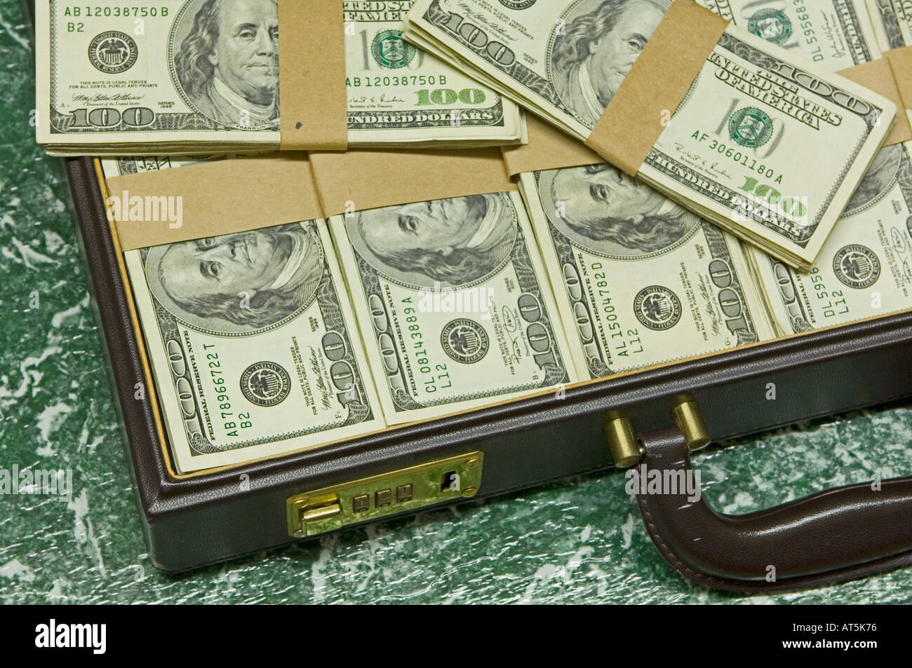Briefcase Full 100 Dollar Bills High Resolution Stock Photography and