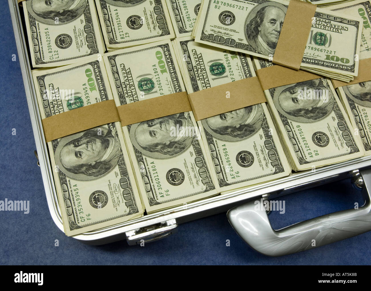 Briefcase Full 100 Dollar Bills High Resolution Stock Photography and