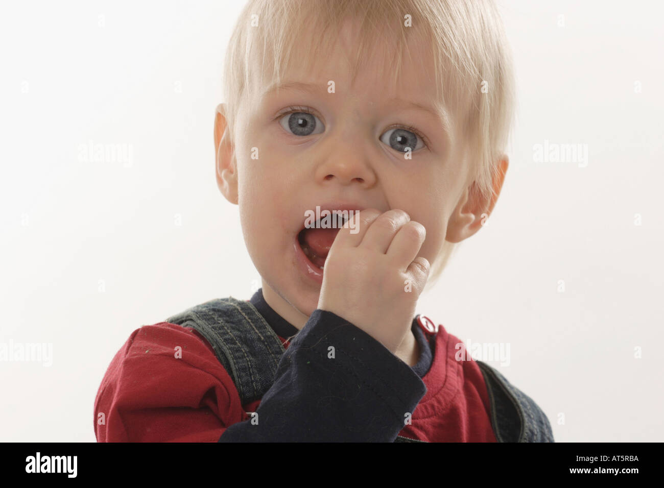 Kind beim Naschen Stock Photo