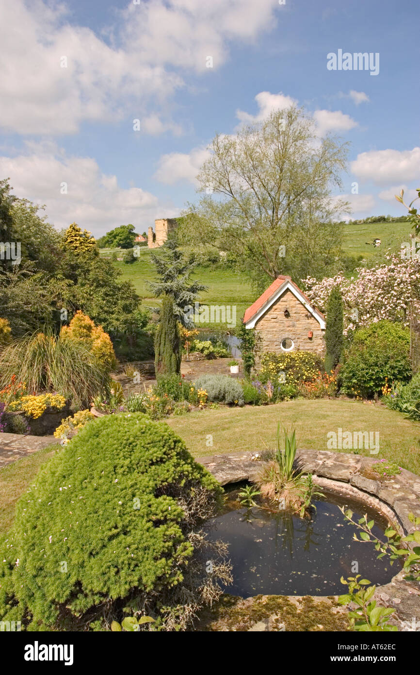 Spring garden overlooking River Derwent and Ayton Castle near Scarborough N Yorkshire UK Stock