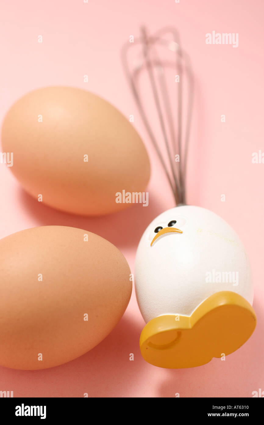 Eggs with  Egghead Whisk Stock Photo