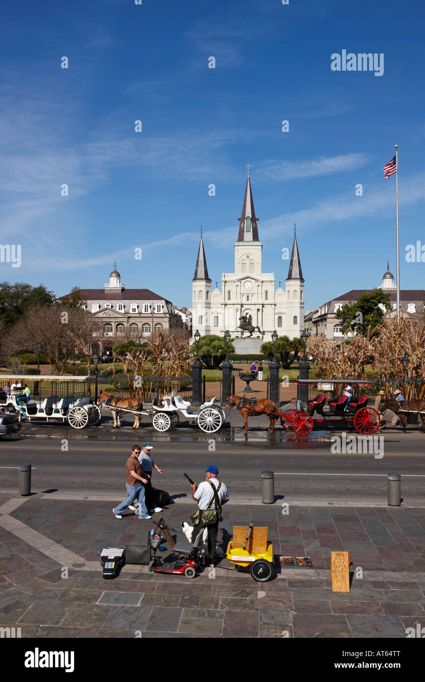 A street musician plays music on Decatur Street in front of the 18th ...