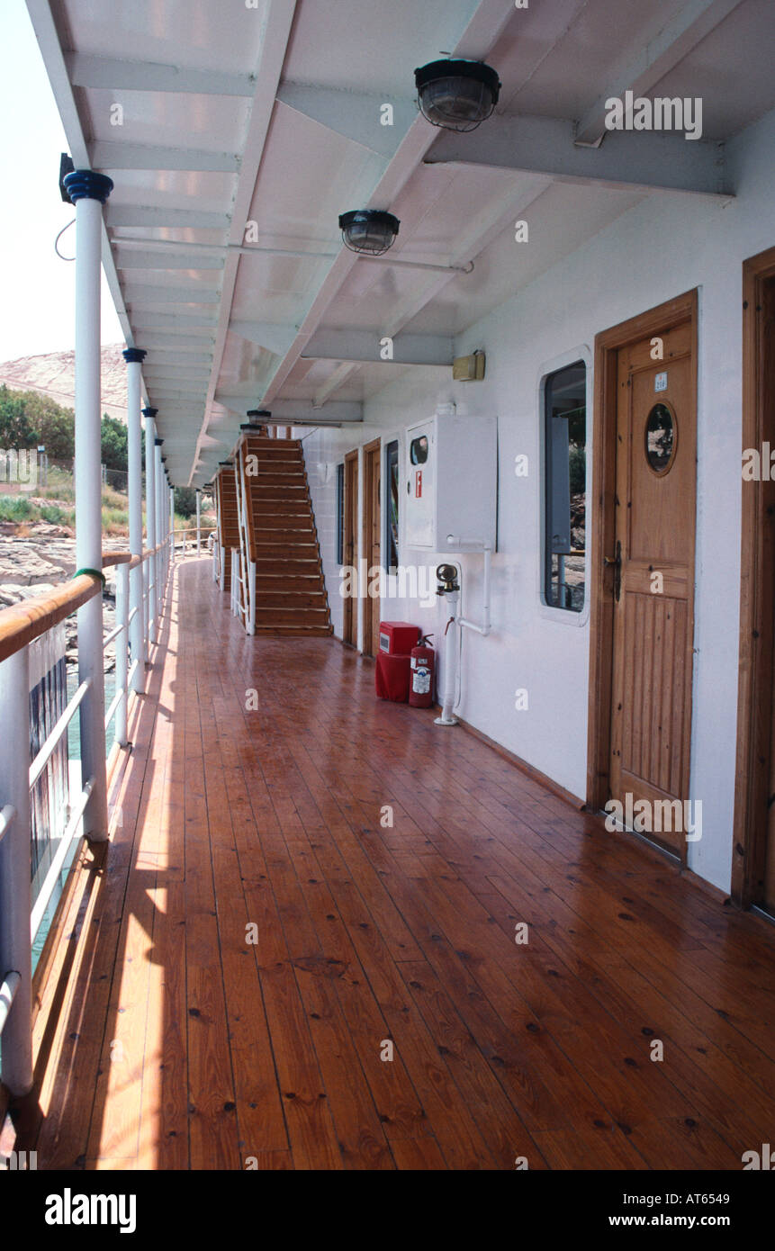 One of the outdoor corridor decks showing the doors to the cabins on board MS Prince Abbas.  Lake Nasser, Egypt. Upper Egypt / Nubia, Egypt. Stock Photo