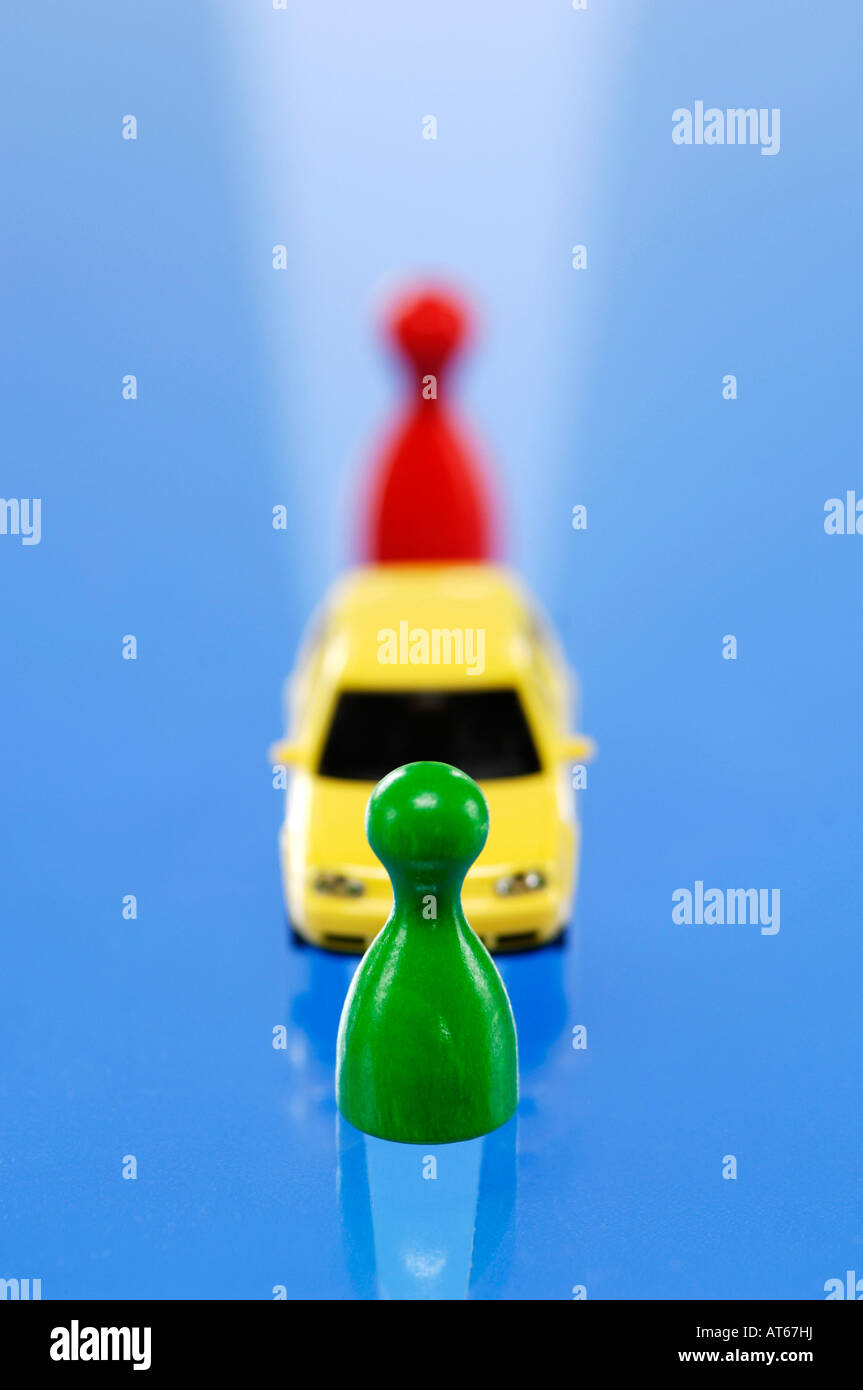 Games pieces and toy car, closeup Stock Photo Alamy