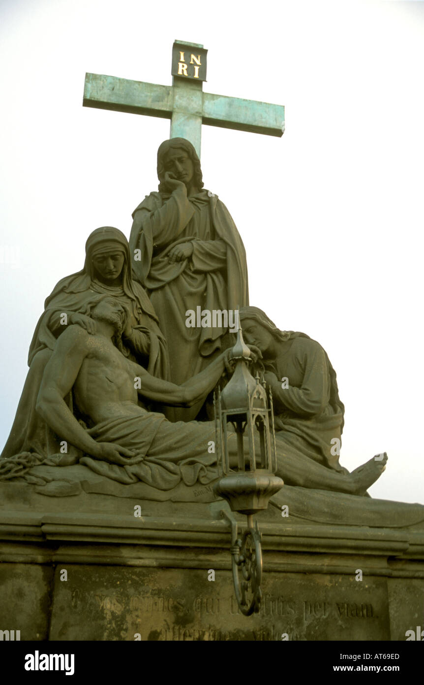 religious Christian statuary of Jesus and cross in the ancient city of Prague Praha Czeck Republic Stock Photo