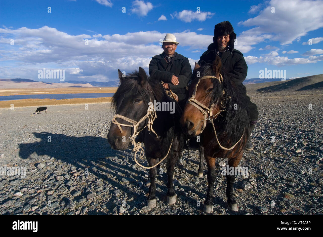Two kazak nomads on horsebak in Sagsai, Bayan Olgi, Mongolia Stock Photo