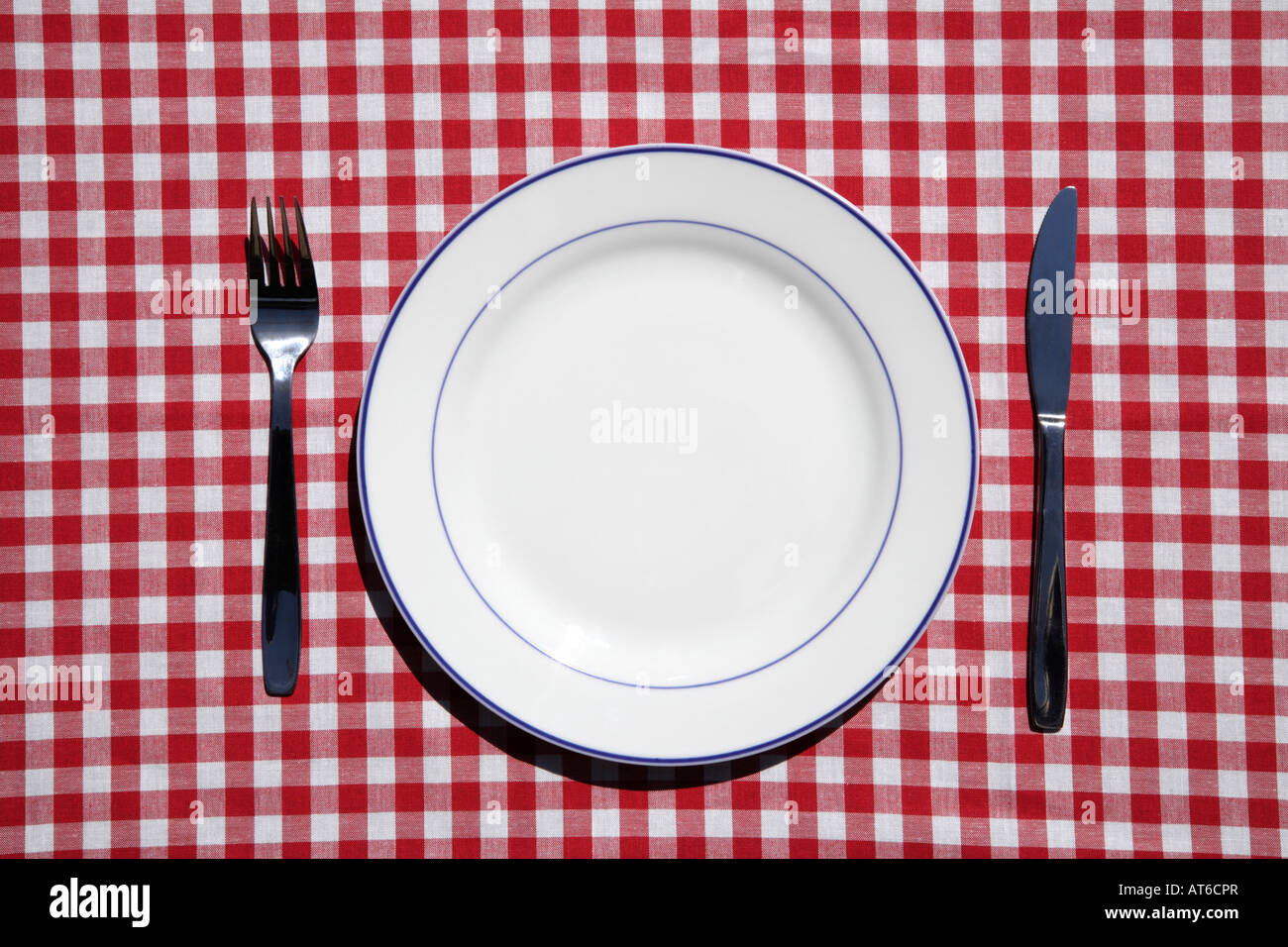 Table setting with plate and silverwear Stock Photo
