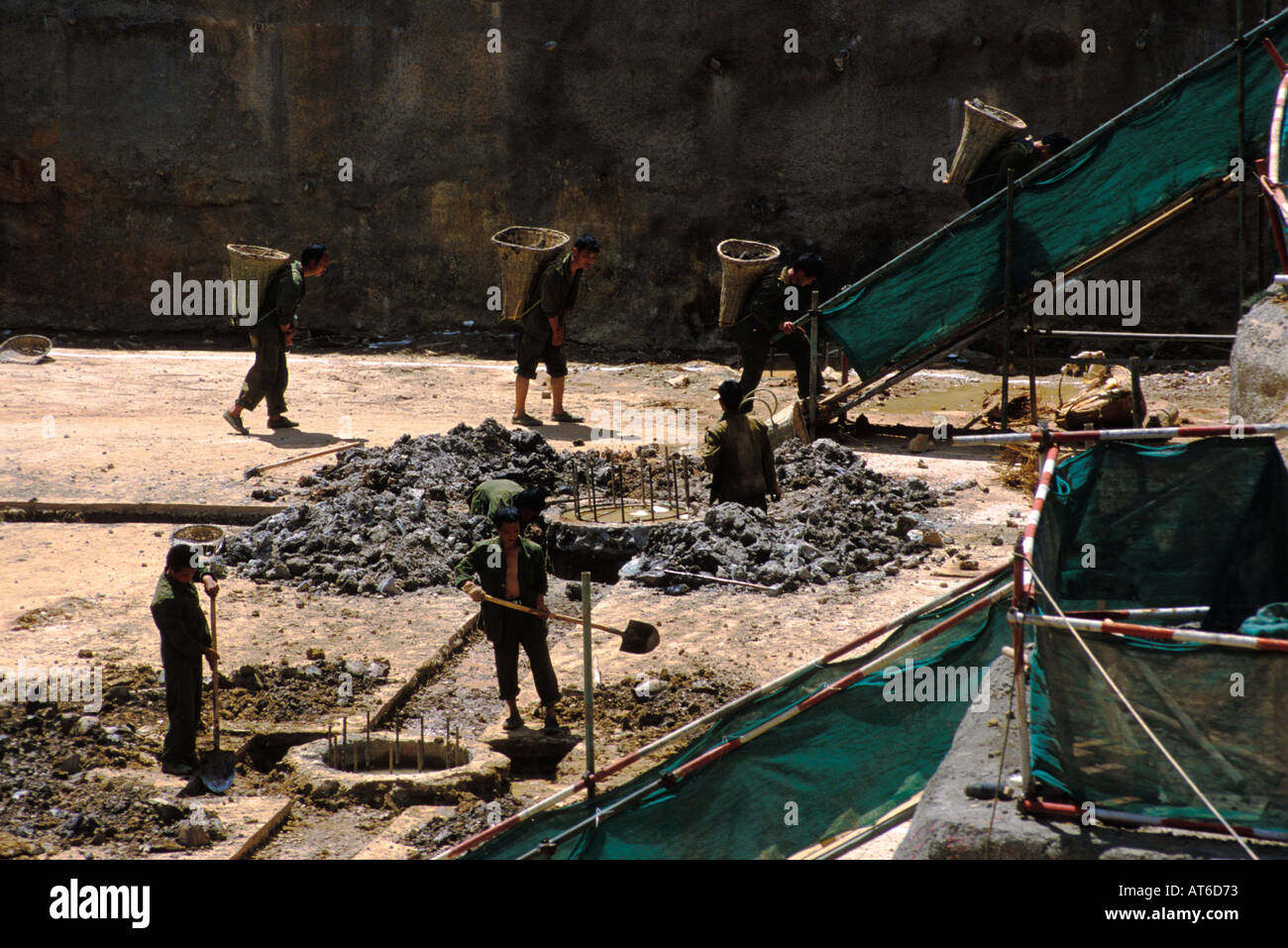 Chinese worker carrying construction hi-res stock photography and ...