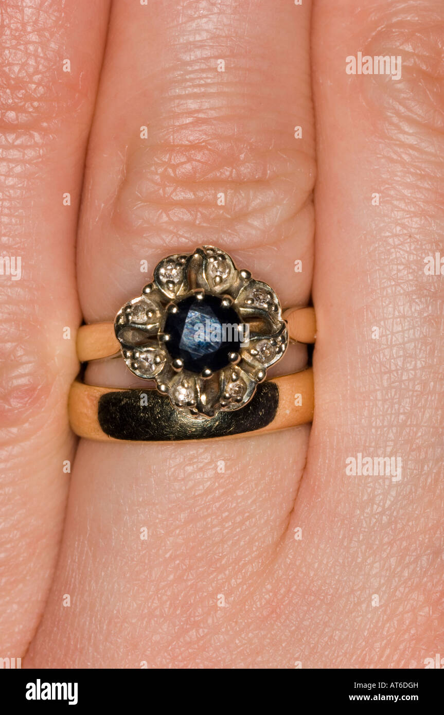 Hand showing wedding engagement rings hi-res stock photography and ...