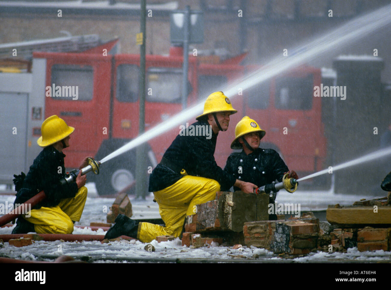 Firemen douse a factory fire in Colindale, North London UK Stock Photo