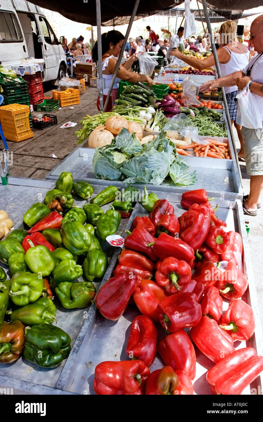 Red Peppers on sale at local market Spain Stock Photo
