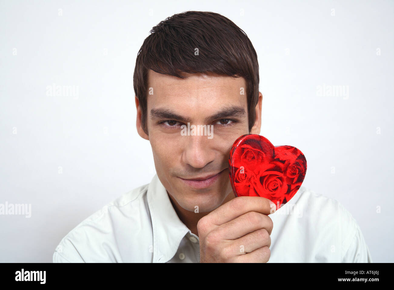 Man holding red heart, close-up Stock Photo