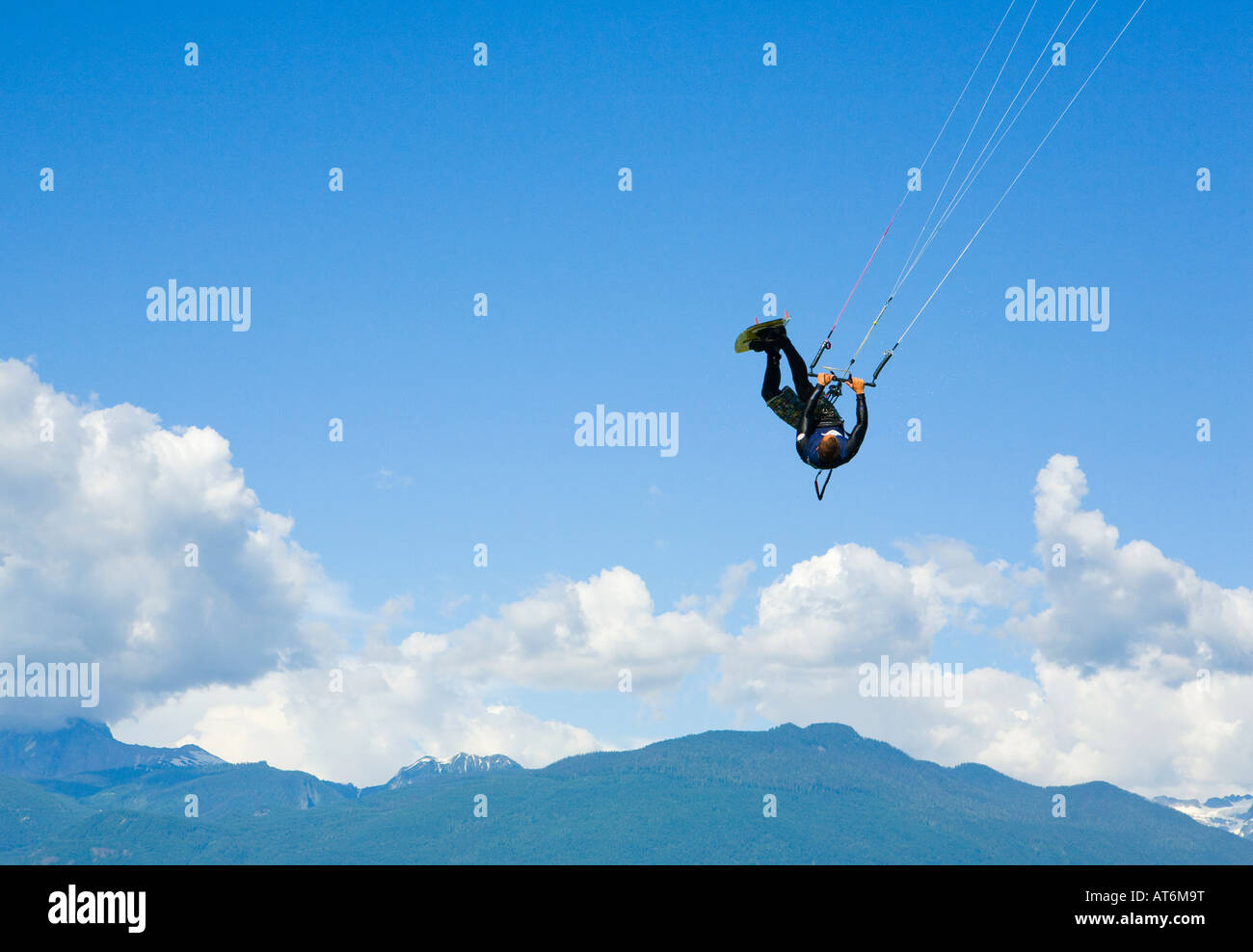 Kite surfer catching some air on the Howe Sound near The Spit in Squamish BC Canada Stock Photo