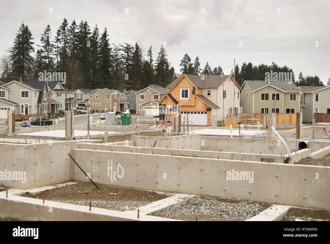 Suburban sprawl takes over a former open field in a Seattle suburb. Stock Photo
