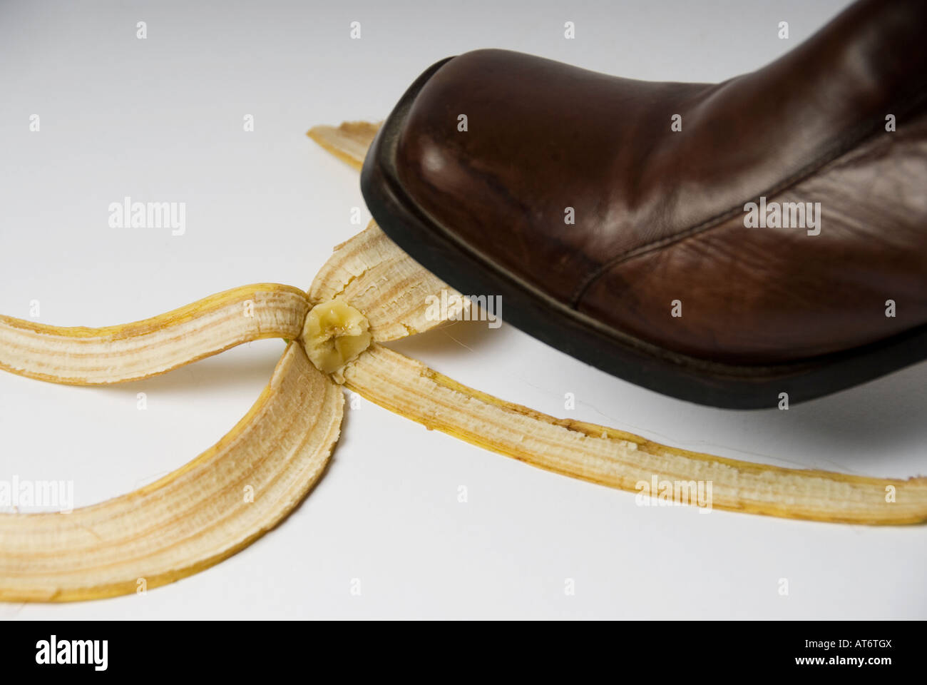 A foot about to slip on a Banana skin Stock Photo Alamy
