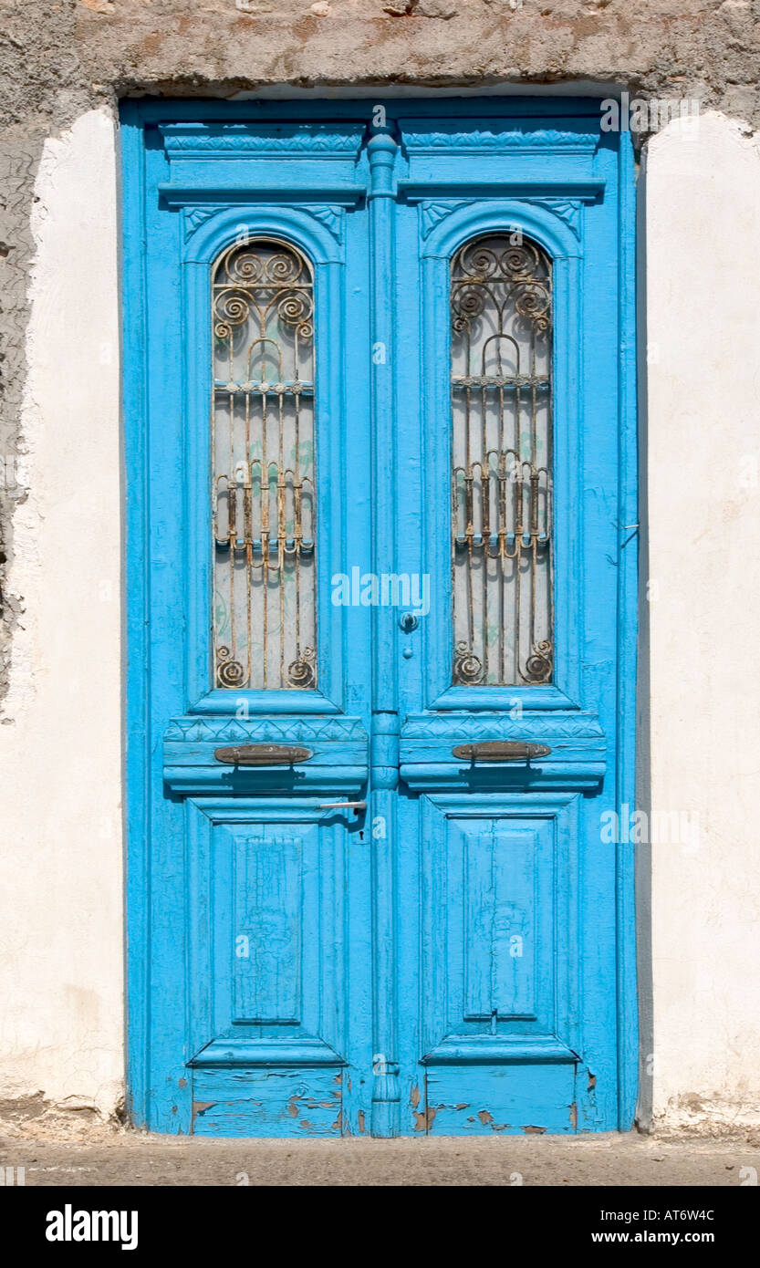 Blue village house doorway undergoing renovation Stock Photo