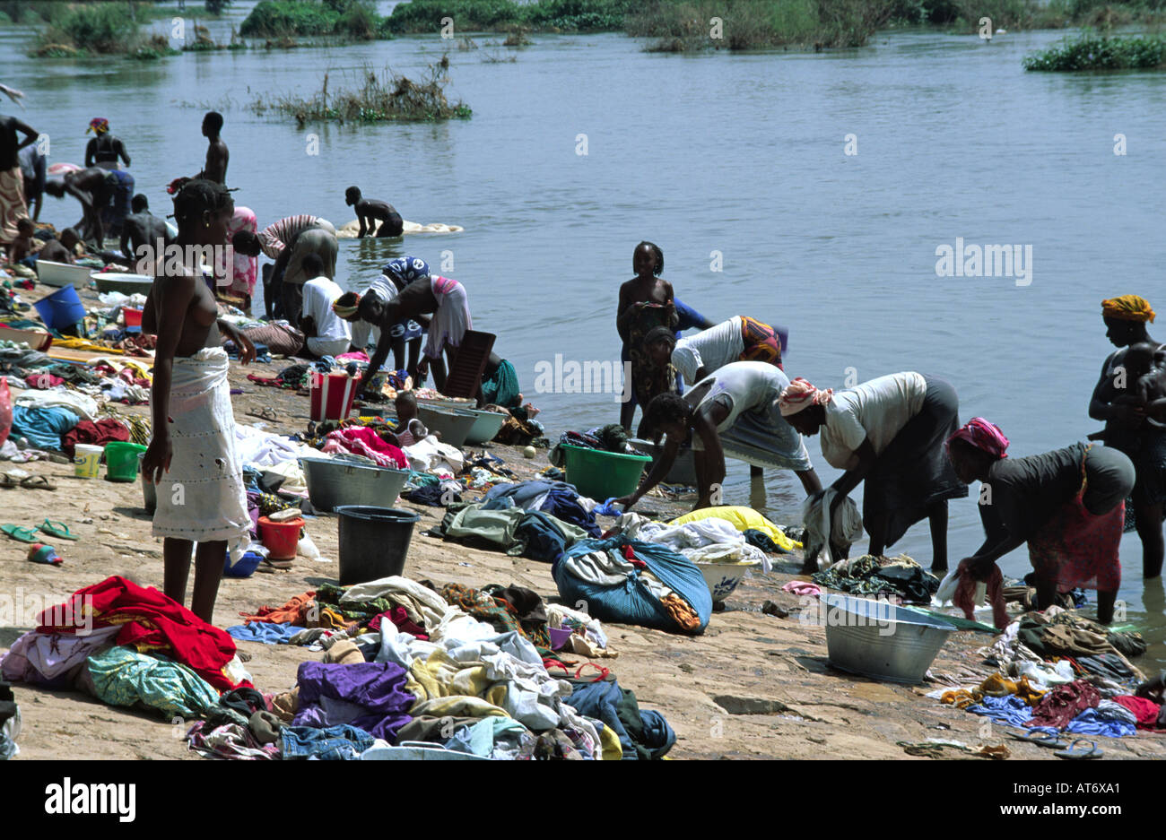 Women washing clothes on the banks of the River Niger. Bamako, Mali Stock Photo