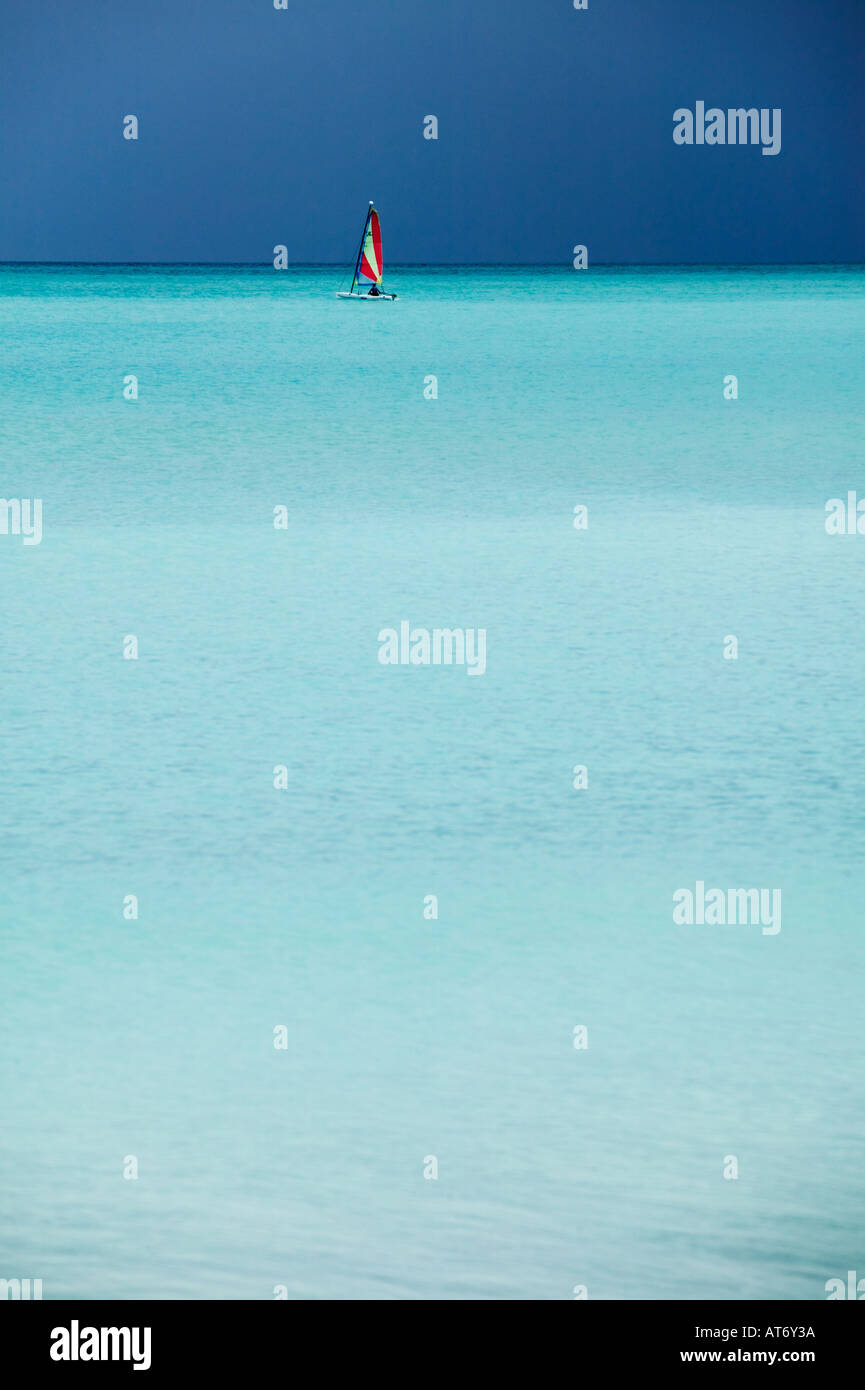 Small dinghy sailing in the caribbean Stock Photo Alamy