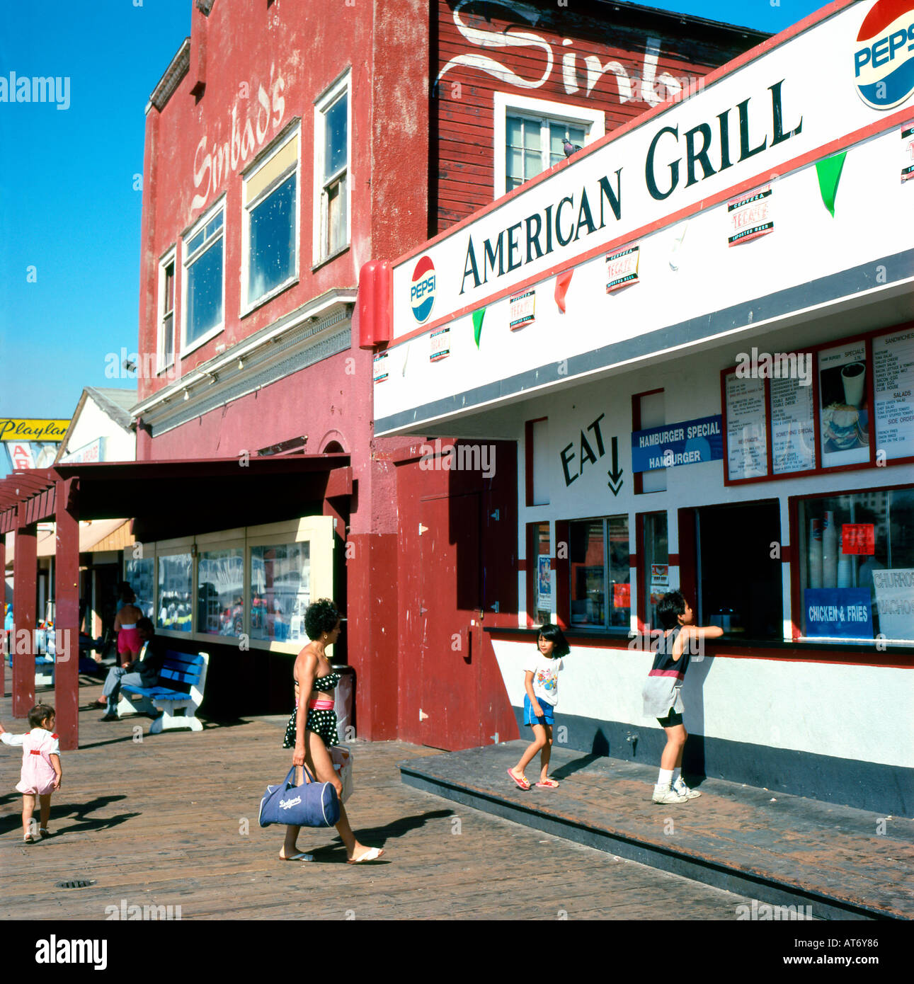 Girl and boy on boardwalk hires stock photography and images Alamy