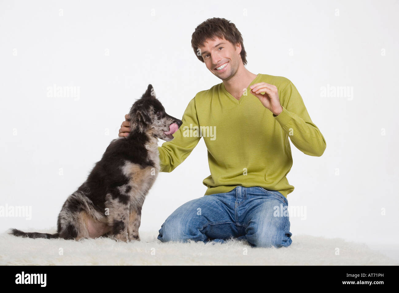 Young man with dog, portrait Stock Photo