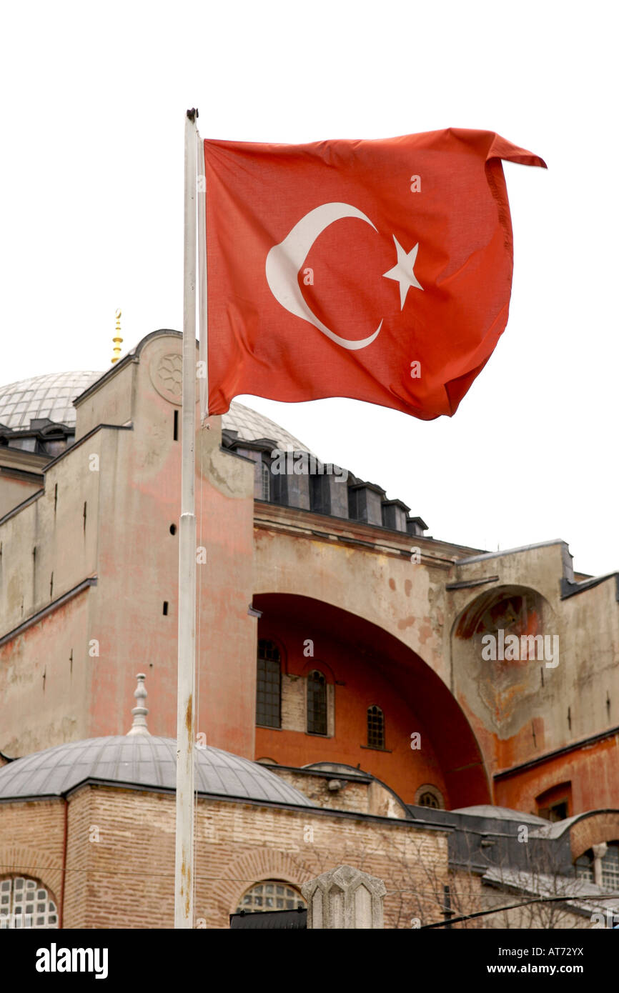 Turkish flag seen against a backdrop of part of the Aya Sofya (Hagia Sophia) in Istanbul, Turkey. Stock Photo