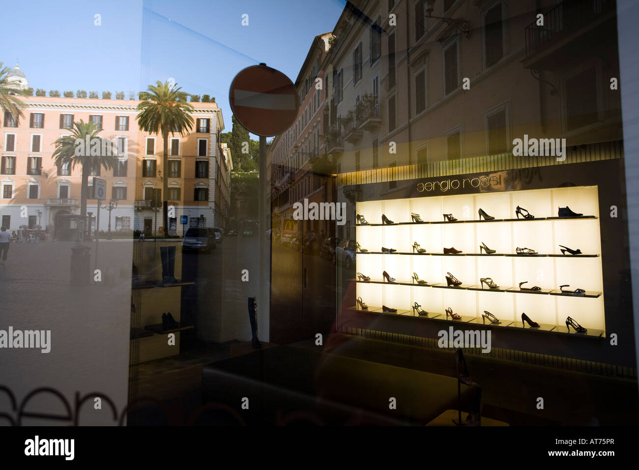 Piazza di Spagna reflections on Sergio Rossi shop window, Rome Stock Photo  - Alamy