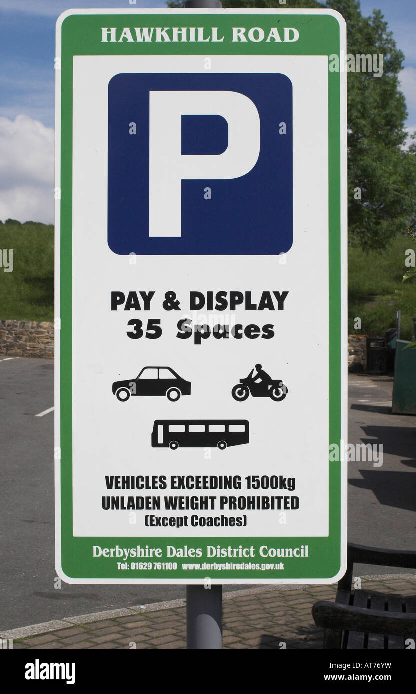 A pay and display car park sign.  Hawkhill Road. Eyam, Derbyshire, United Kingdom. Stock Photo