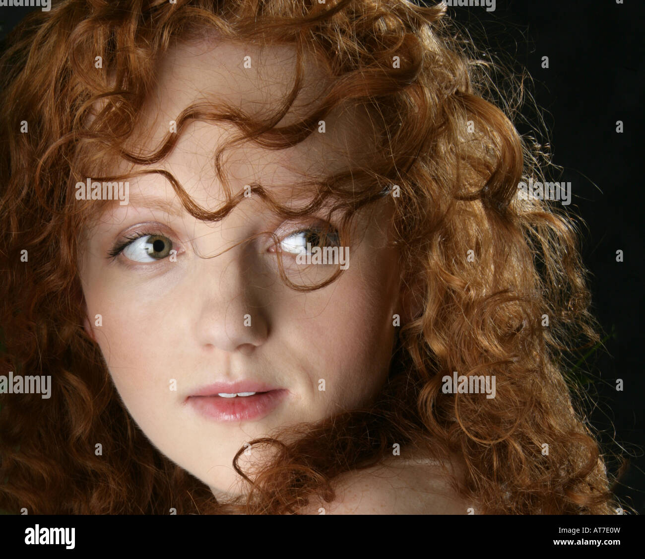 Portrait of a Young Red Haired Girl Stock Photo
