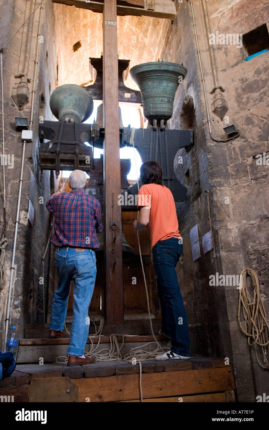 Bell ringers playing  in the tower bell known as the Torre del Miguelete next to the cathedral of Valencia, Spain Stock Photo