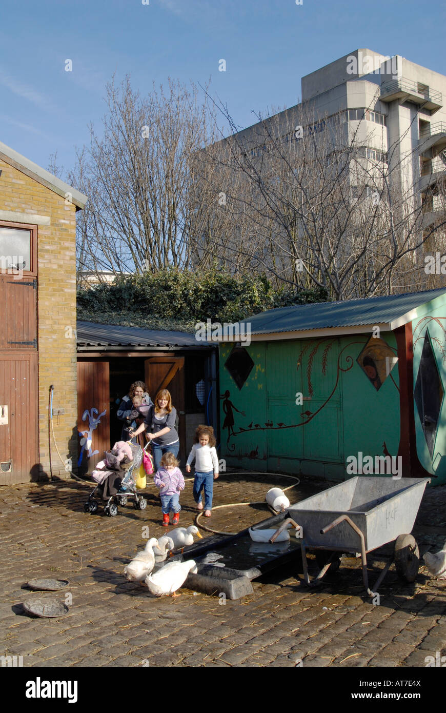 UK Families visiting the Hackney City Farm in east London Stock Photo