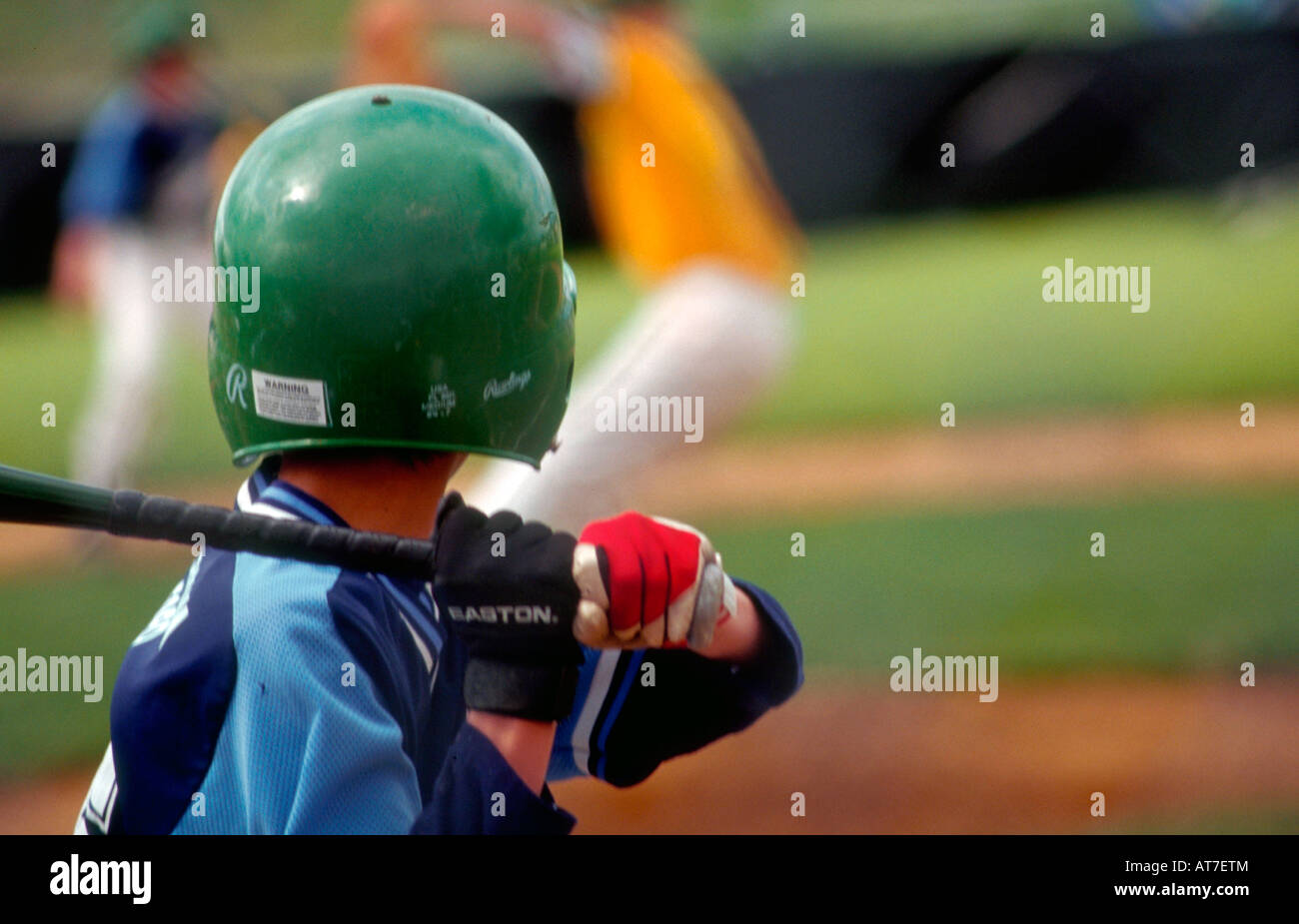 Rear view of a Little League batter Stock Photo