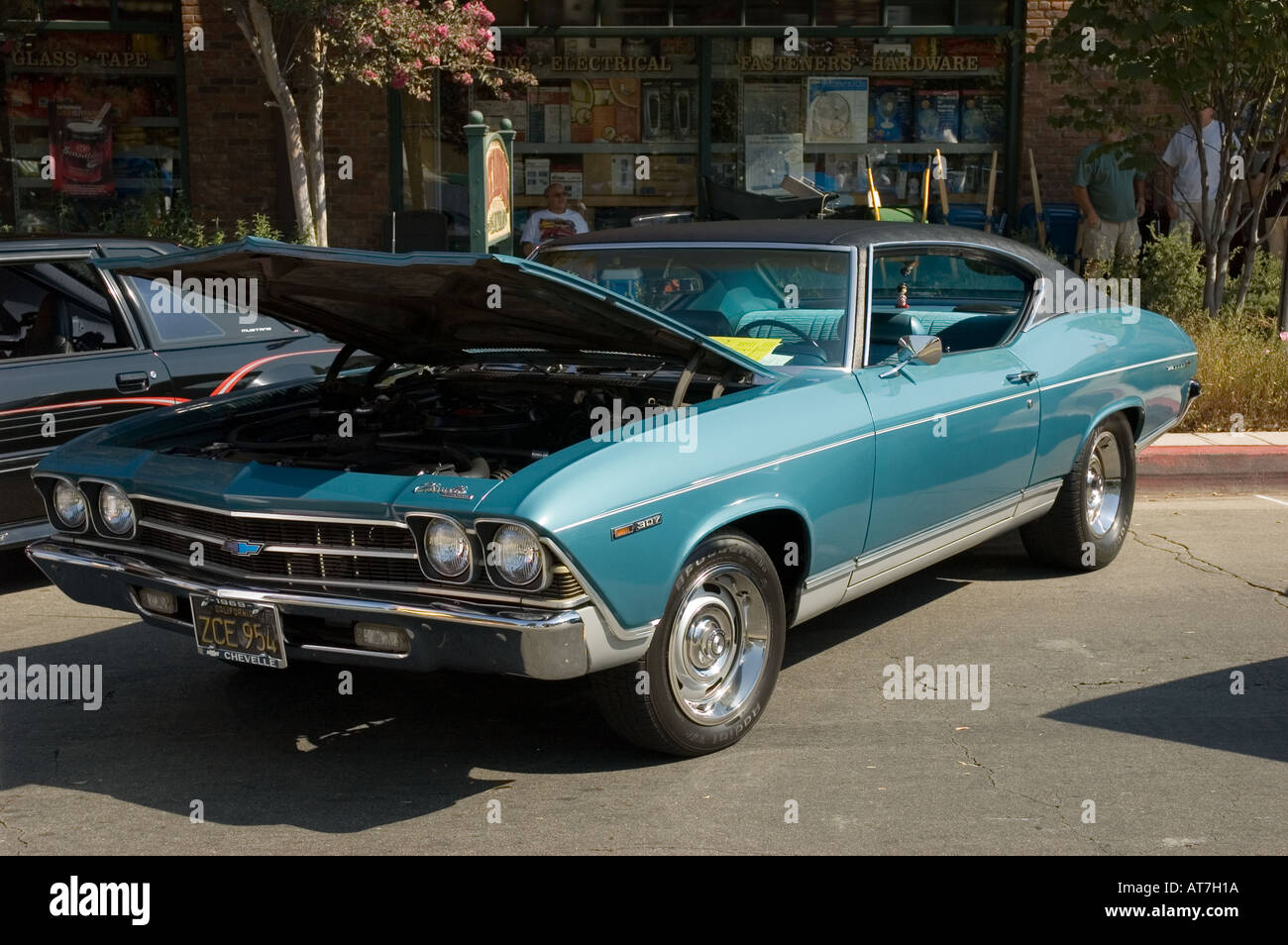Los Angeles California car show antique customized Chevrolet Chevy Chevelle 1969 69 307 coupe 2 two door blue open hood engine Stock Photo