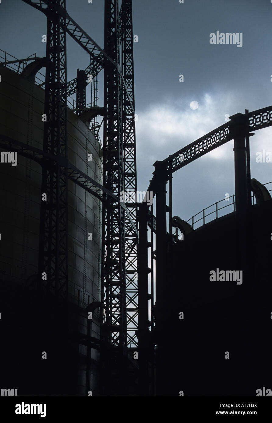 Gas towers overlooking Regent's canal London with moon Stock Photo Alamy