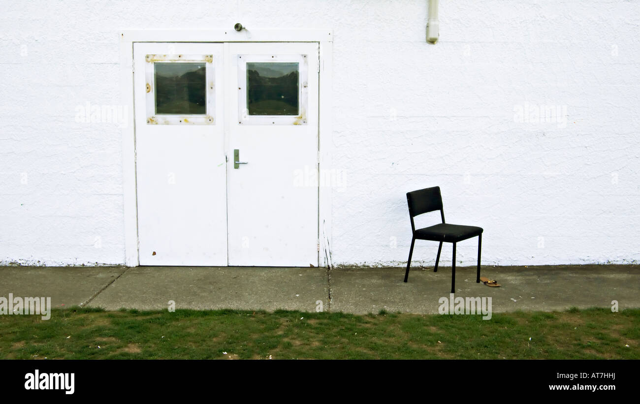 Chair doors white wall Stock Photo Alamy