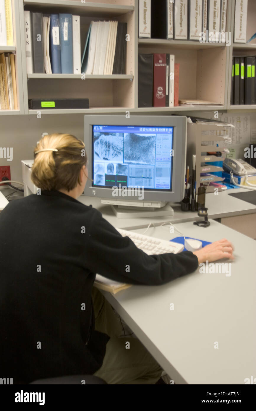 Expert using AFIS, Automated Fingerprint Identification System