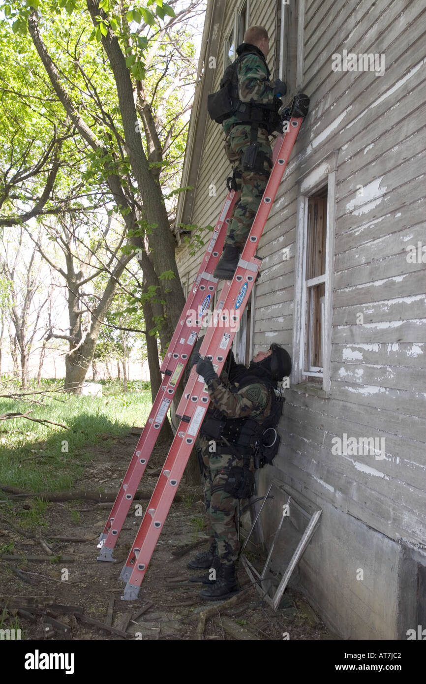 Police Swat Team Entering Second Floor Via Ladders Nebraska State