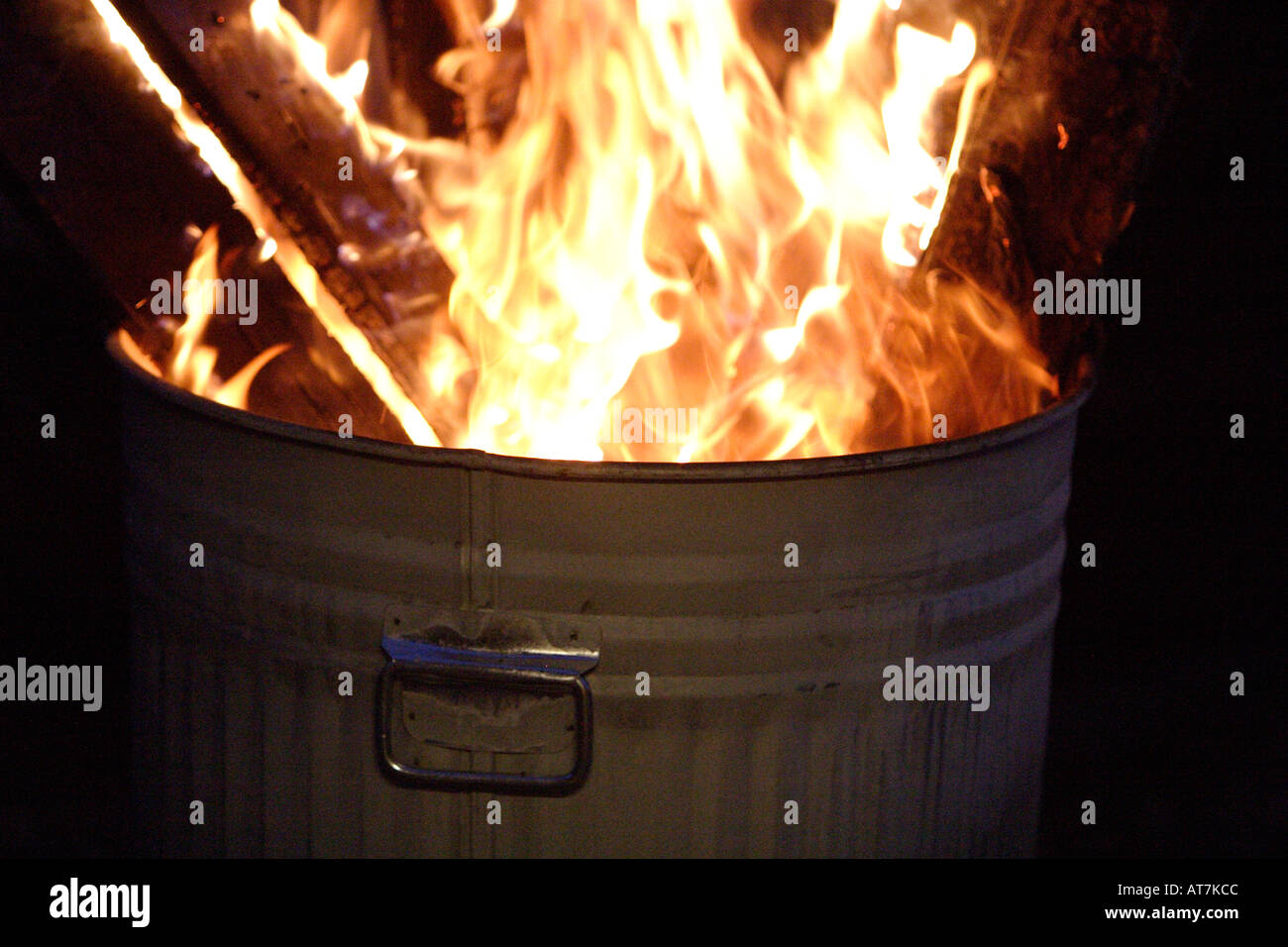Burning rubbish in a garden incinerator Stock Photo Alamy