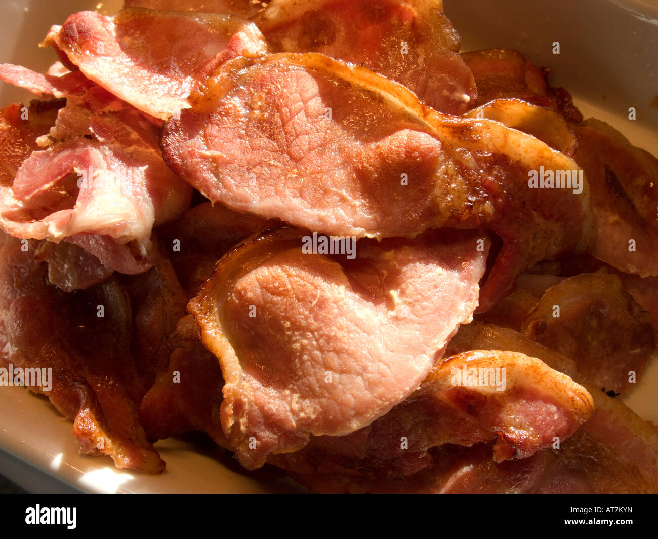 Pile of cooked rashers of bacon Stock Photo Alamy