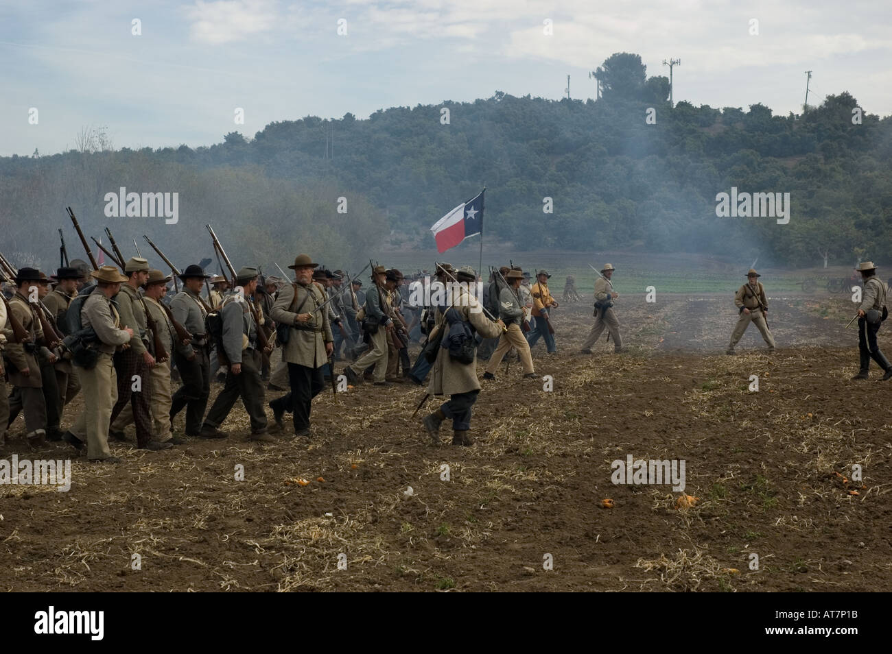 Soldiers marching on battlefield at Civil War reenactment event Stock ...