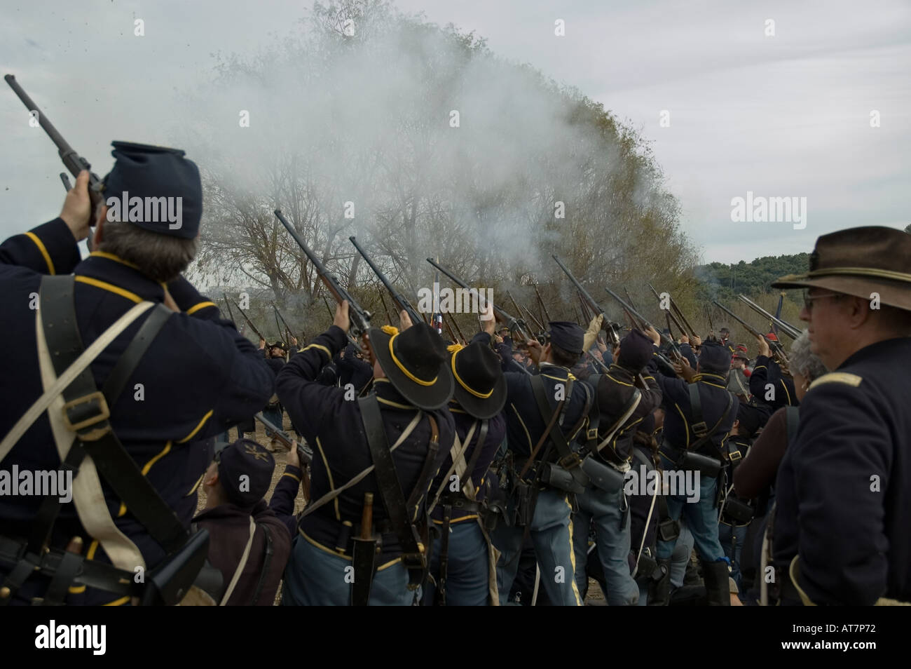 Firing squad shooting blanks at Civil War reenactment event Stock Photo