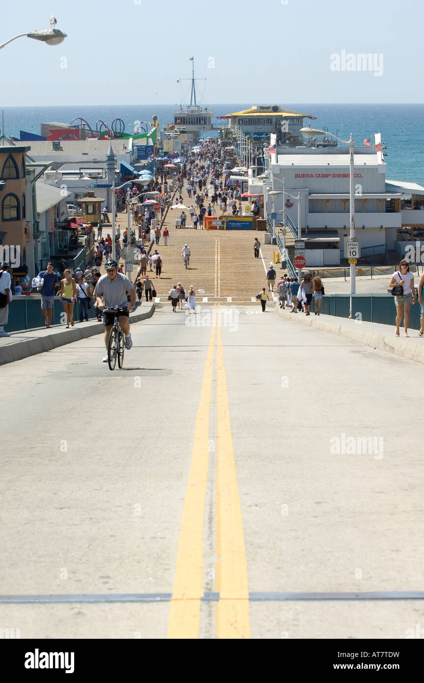 A man rides his bicycle up the steep ramp leading to the famous Santa ...
