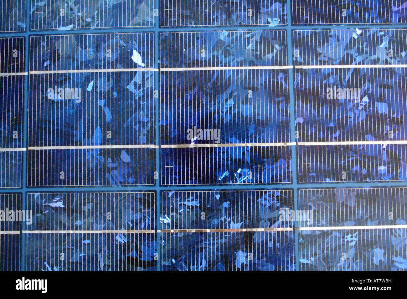 blue tinted polycrystalline silicon photovoltaic solar panel background Stock Photo