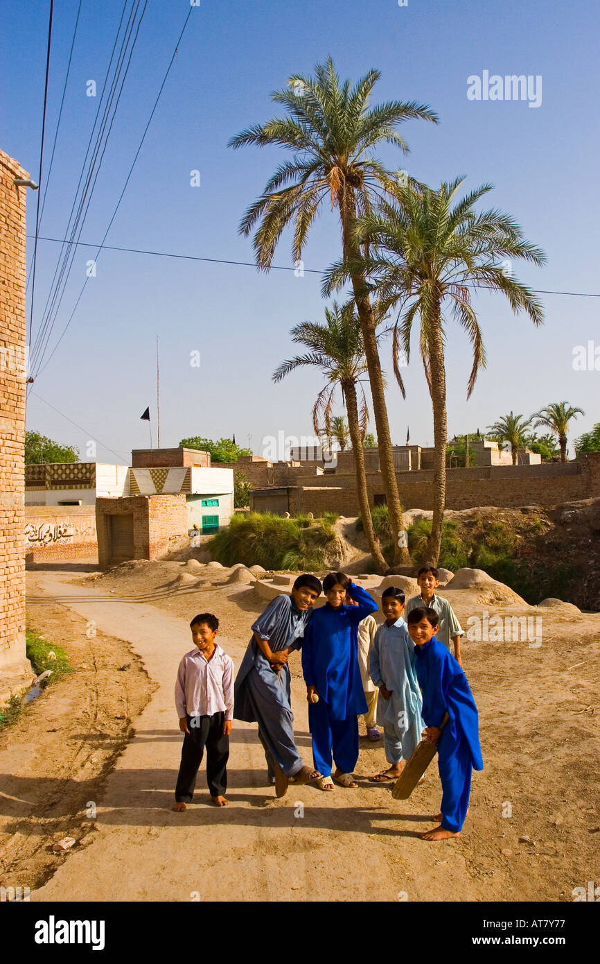 Friendly little children welcoming the few visitors at Uch Sharif Uch Sharif Pakistan Stock Photo