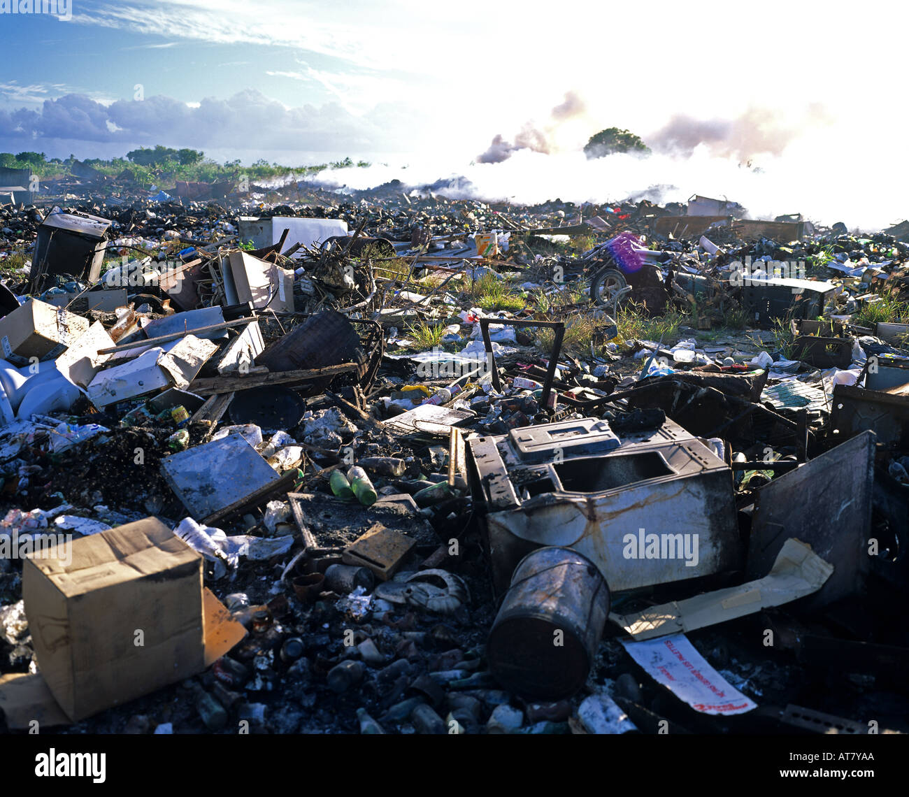 Rubbish dump and smouldering fire smoke, Guadeloupe, French West Indies