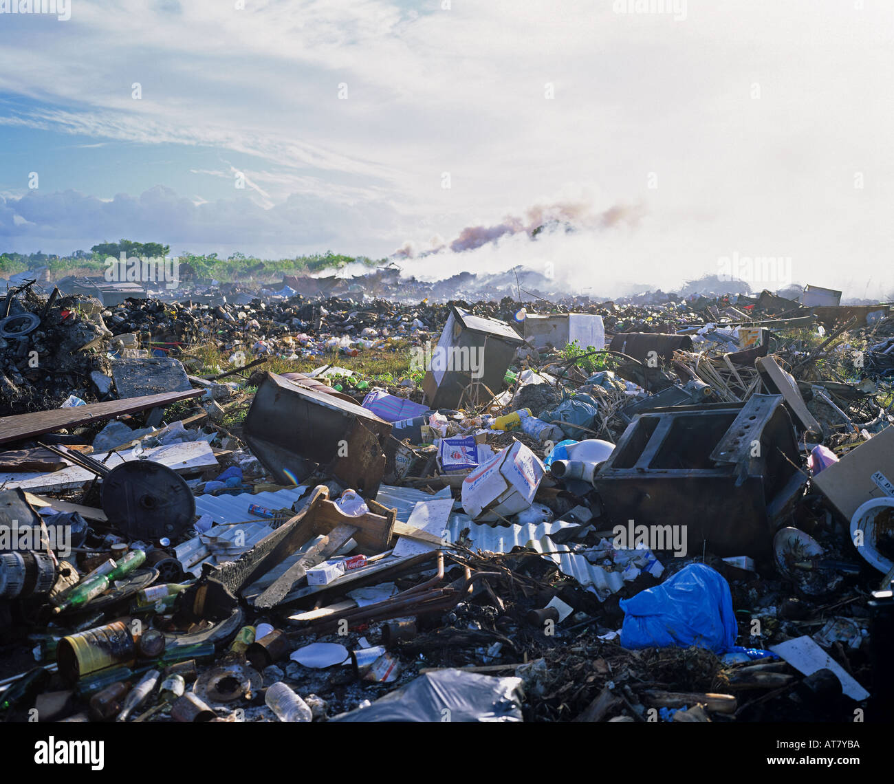 Rubbish dump and smouldering fire smoke, Guadeloupe, French West Indies Stock Photo