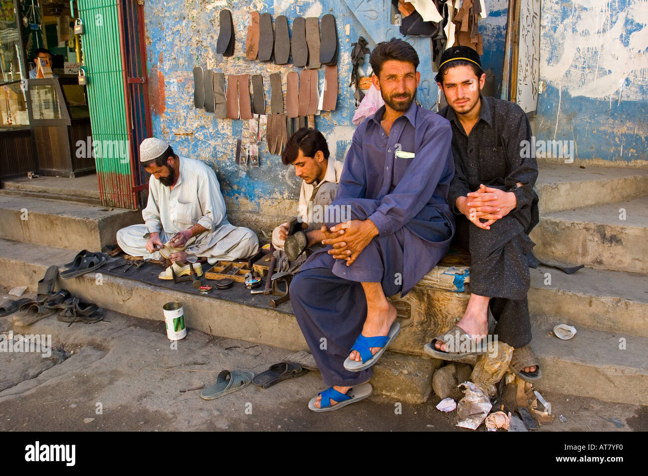 Pakistani streetworkers along the street of Gilgit Gilgit Pakistan Stock Photo