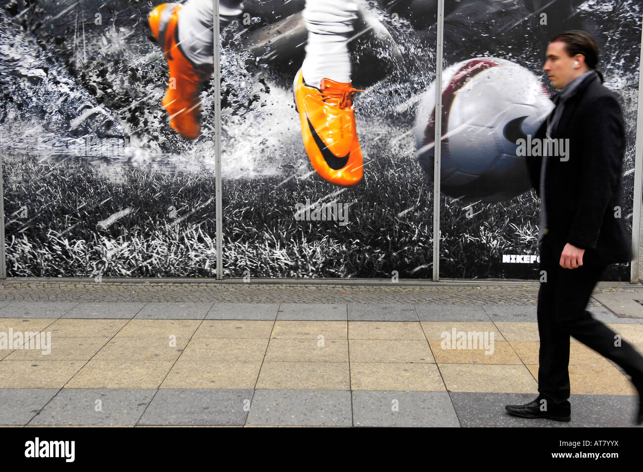 niketown ku-damm berlin sportswear nike store shopping consumerism ronaldo  orange images soccer football germany pedestrian Stock Photo - Alamy