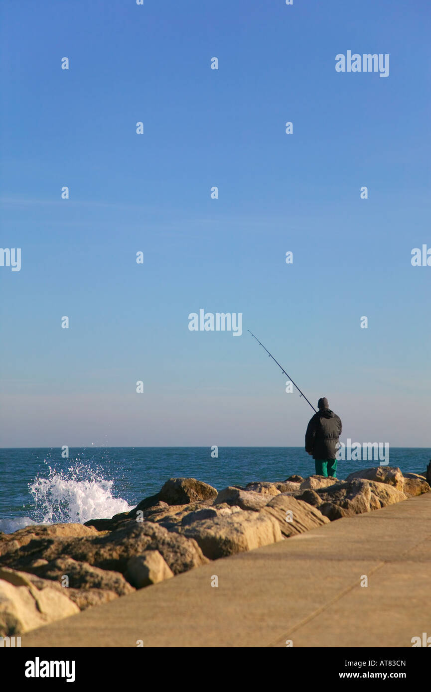 Sea rocks fishing rod hi-res stock photography and images - Alamy